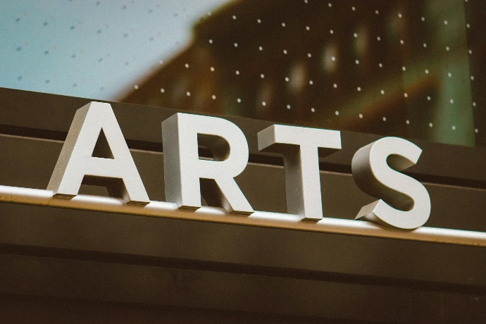 The word "arts" in bold letters.